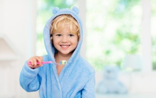 Child brushing teeth